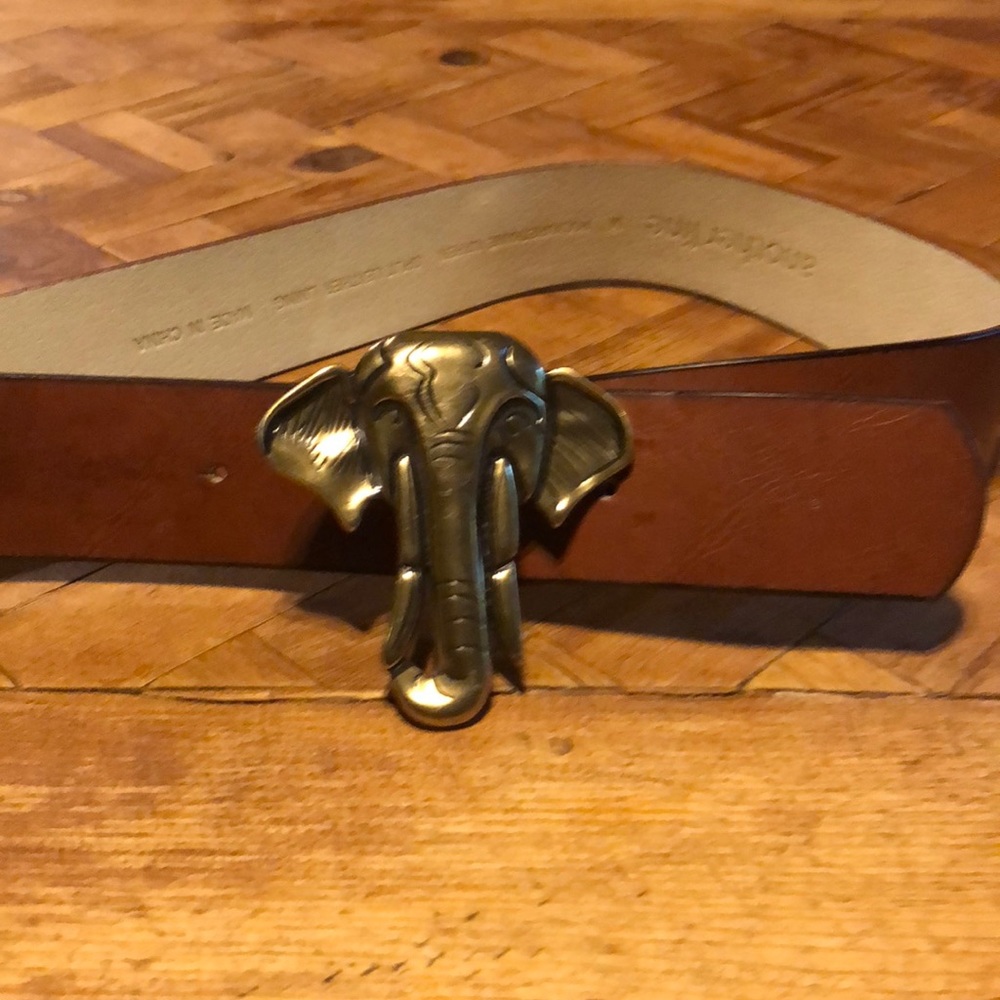 Leather belt with brass elephant buckle